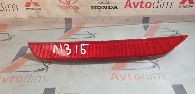 Левый отражатель бампера 84281SC010 SUBARU