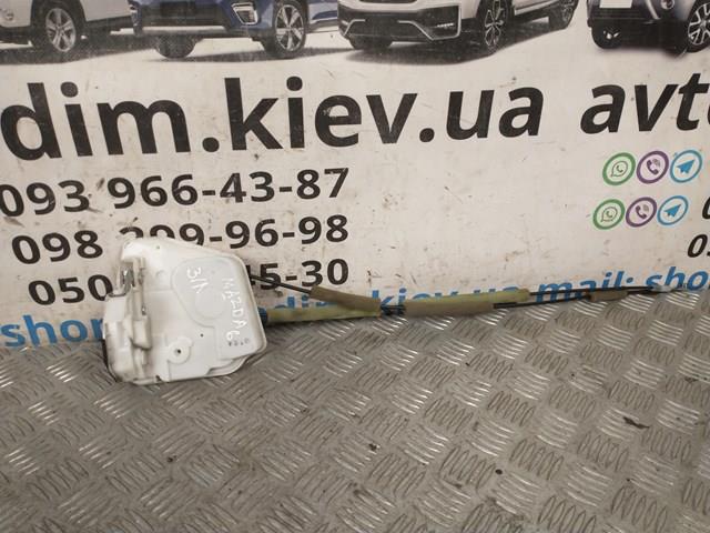 Замок задней двери, левой GS1F73310B MAZDA