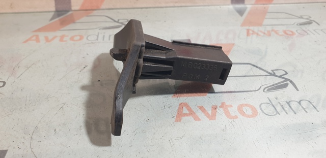 MB023335 MITSUBISHI Замок открывания лючка бензобака купить в Николаев