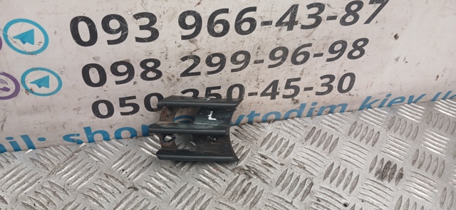 Заглушка, решетка противотуманных фар бампера переднего, левая MR496691 MITSUBISHI