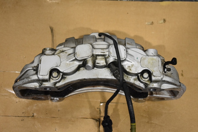 PORSCHE 95B615123A Суппорт тормозной передний левый в наличии Ирпень