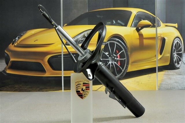 Стойка передняя левая 99734304723 PORSCHE