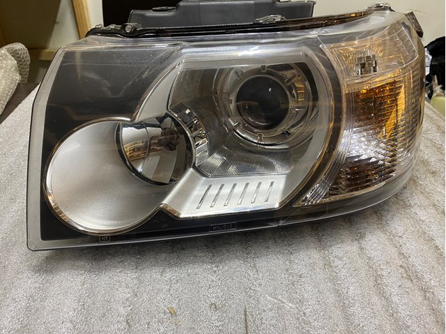 Фара левая LR039777 LAND ROVER