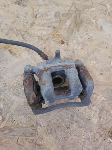 Задний левый суппорт 583103QA10 HYUNDAI