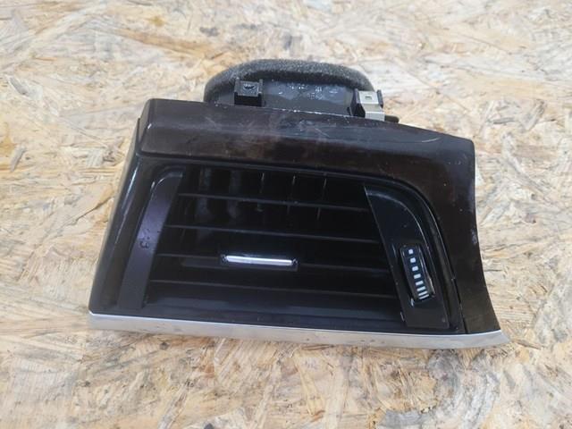 Решетка вентиляции салона на "торпедо", левая 9218549 BMW