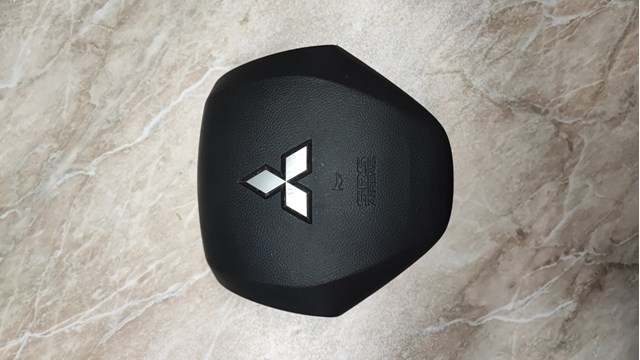 Подушка безопасности водителя 7030A459XA MITSUBISHI