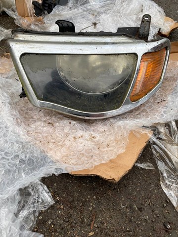 Фара левая передняя 8301B471 MITSUBISHI