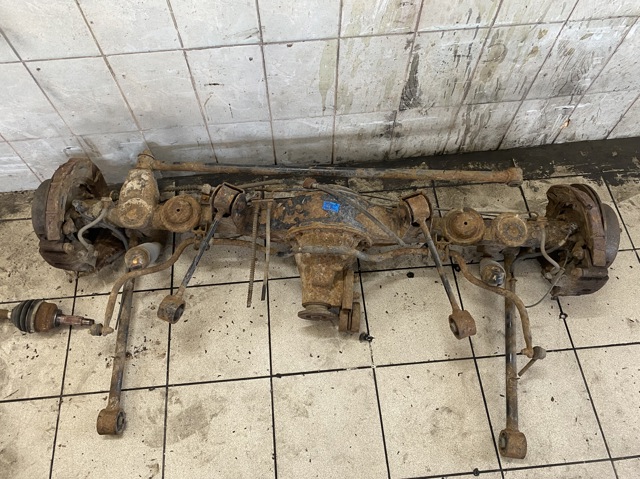 Тяга задней подвески продольная верхняя 552003E000 HYUNDAI