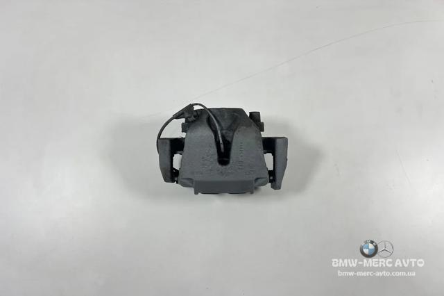 Суппорт тормозной, передний, левый 34116776783 BMW