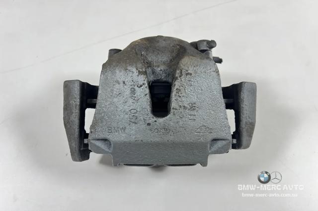 Суппорт тормозной передний правый 34116776784 BMW