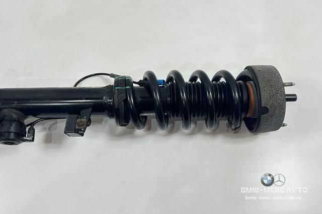Амортизатор подвески передний левый 37116875084 BMW