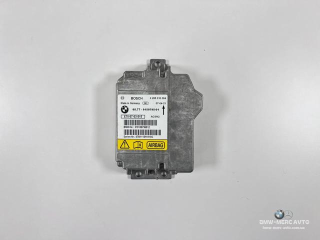 Блок управления airbag 65779141776 BMW
