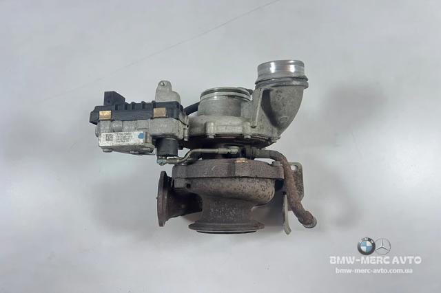 Турбокомпрессор 7799759 BMW
