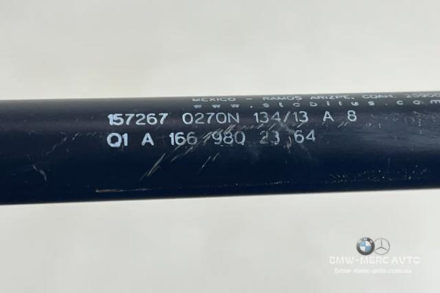 Опора капота левая A1669802364 MERCEDES