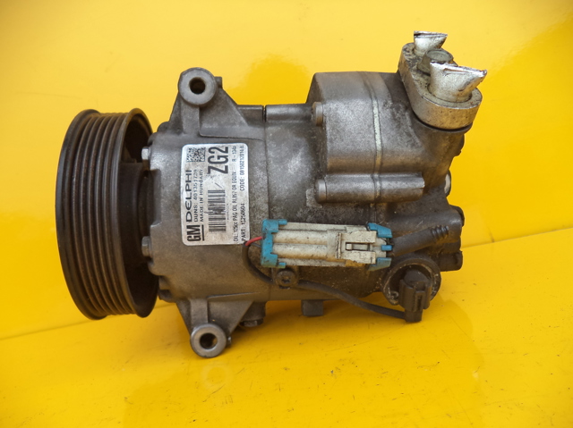 Компрессор кондиционера 13250604 GM