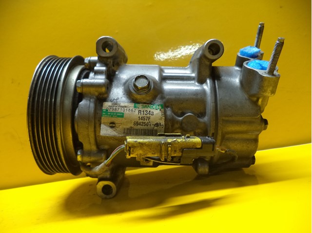 Компрессор кондиционера 694250103 BMW