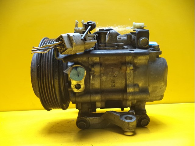 Компрессор климатической установки 73111AE030 SUBARU