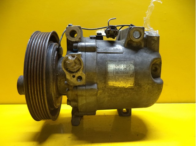 Компрессор климатической установки 926002J204 NISSAN