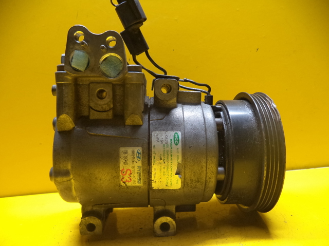 Компрессор климатической установки 977011C150 HYUNDAI
