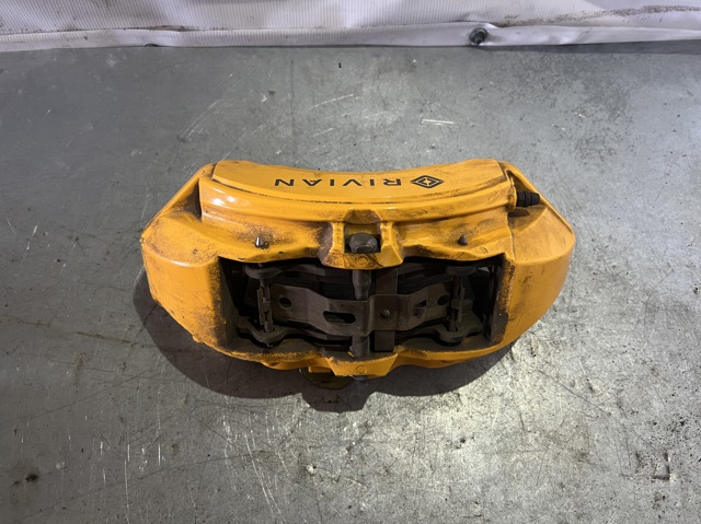 RIVIAN PT00000705 Суппорт тормозной передний левый в наличии Николаев