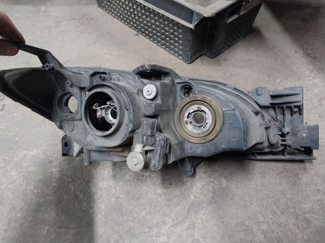 Вставка фары левой BN8F510L0E MAZDA