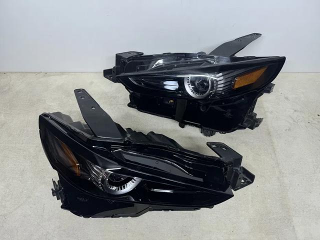 Вставка фары левой DGH951040A MAZDA
