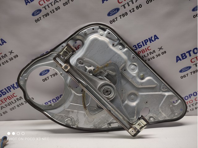 Стеклоподъемник задней левой двери 1738647 FORD