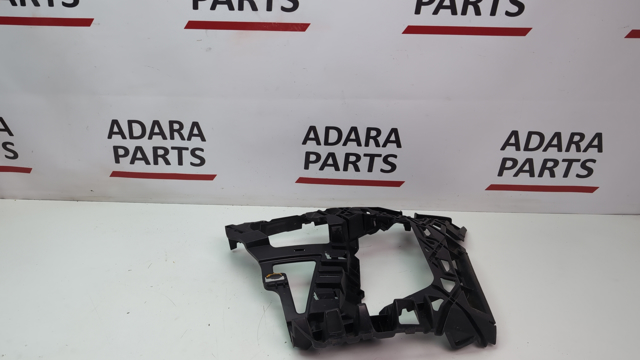 Левый кронштейн переднего бампера 5GM807723A VAG