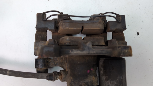 Задний левый суппорт DG9Z2553C FORD