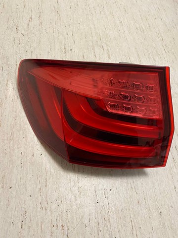 Задний левый внешний фонарь 63217203233 BMW