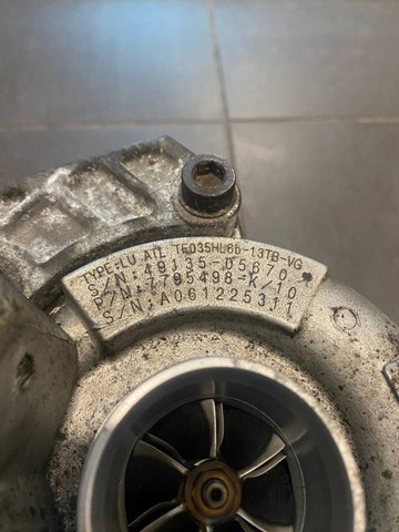 Турбоком 7795498 BMW