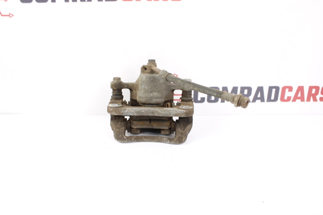 582102K500 HYUNDAI Суппорт задний левый купить в Сумы