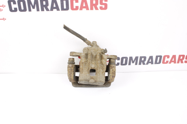 Задний правый суппорт 582302T600 HYUNDAI