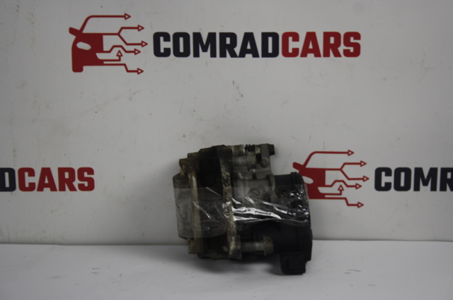 Суппорт тормозной левый задний D40106RA0A NISSAN