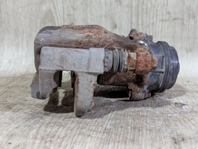 Тормозной суппорт задний левый 440114CA0B NISSAN