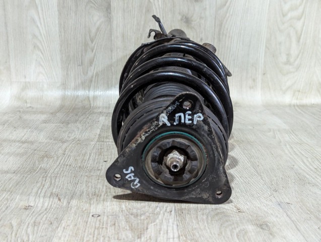 Амортизатор передний левый Ниссан Кашкай II