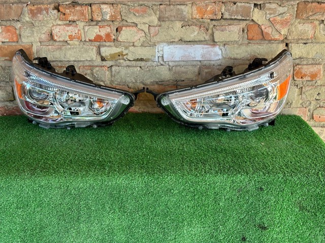 Фара левая передняя 8301B587 MITSUBISHI