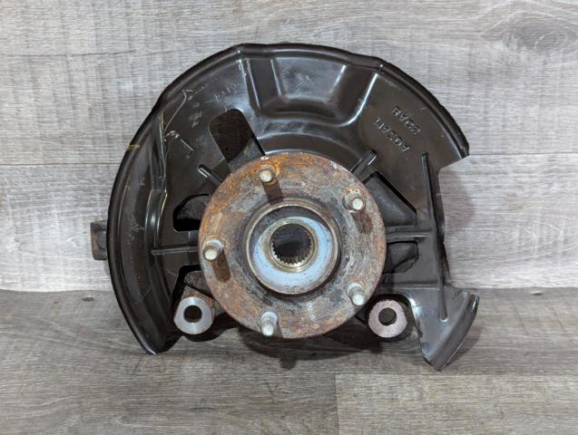 Цапфа - поворотный кулак передний, левый BJS733031 MAZDA