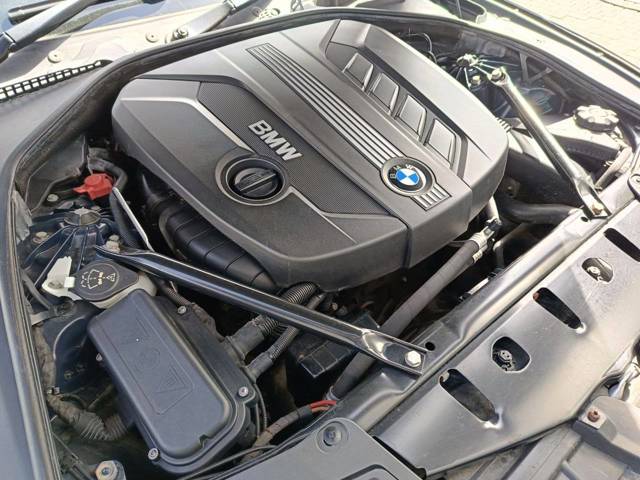Двигатель голый 11002184389 BMW