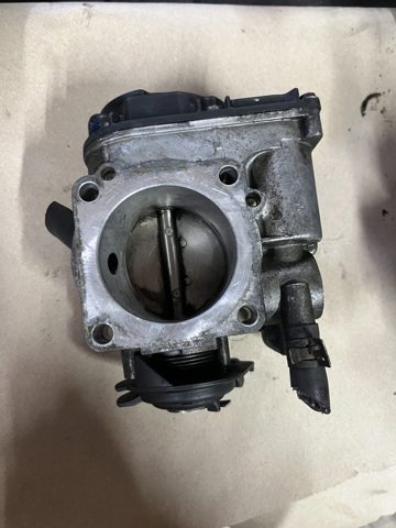 Дроссельная заслонка 06A133064J VAG