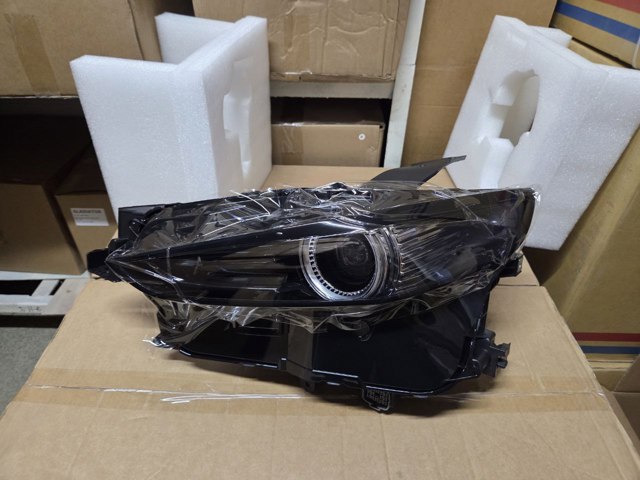 Фара дальнего света в сборе DFR551040E MAZDA