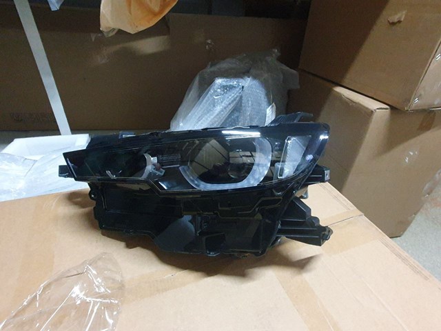 Фара дальнего света в сборе VA4051040B MAZDA