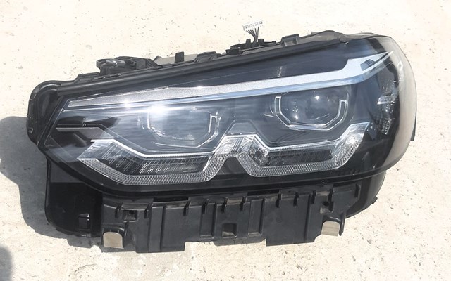 Фара левая передняя 63115A0E5F1 BMW