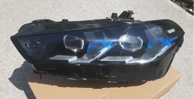 Фара левая 63115A783B3 BMW