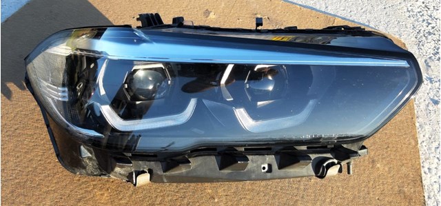 Вставка фары правой 63119850412 BMW