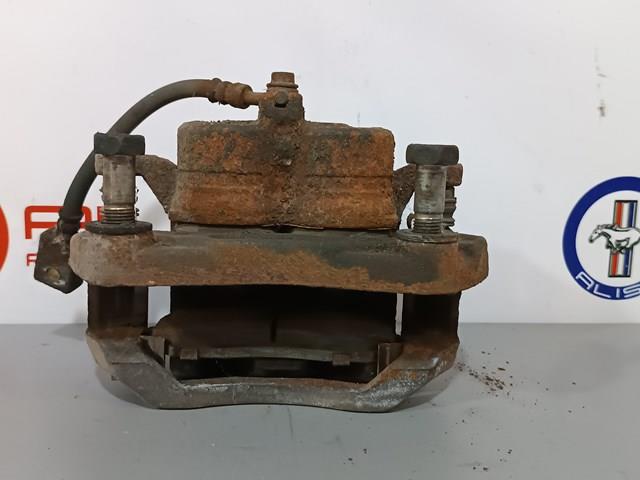 41011EG50A NISSAN Суппорт тормозной передний левый купить в Николаев