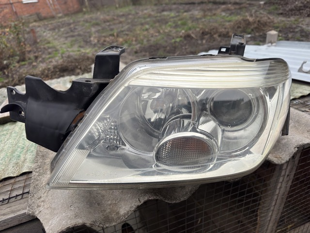Основная фара в сборе левая 8301A169 MITSUBISHI