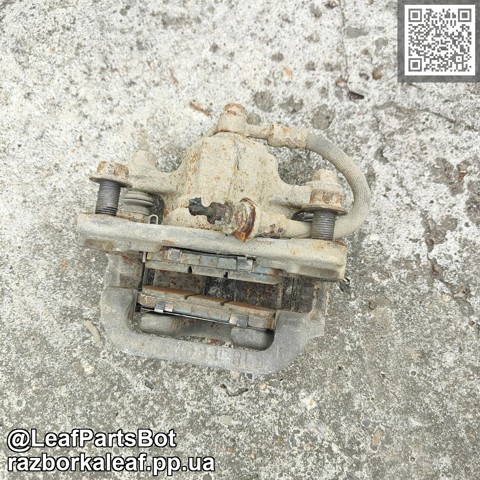 NISSAN 440113NA0A Суппорт задний левый в наличии Ровно