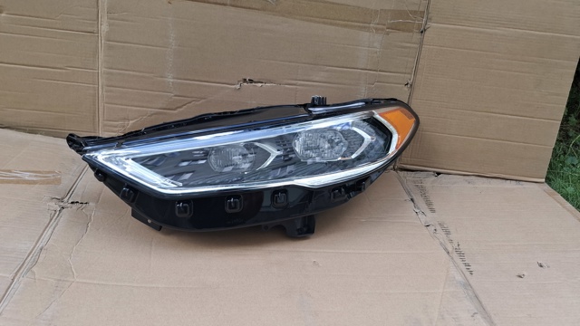 Фара дальнего света в сборе HS7Z13008AA FORD
