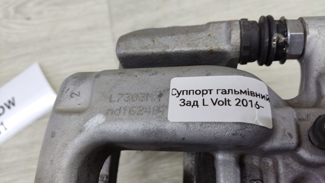 Суппорт тормозной левый задний 13515113 GM